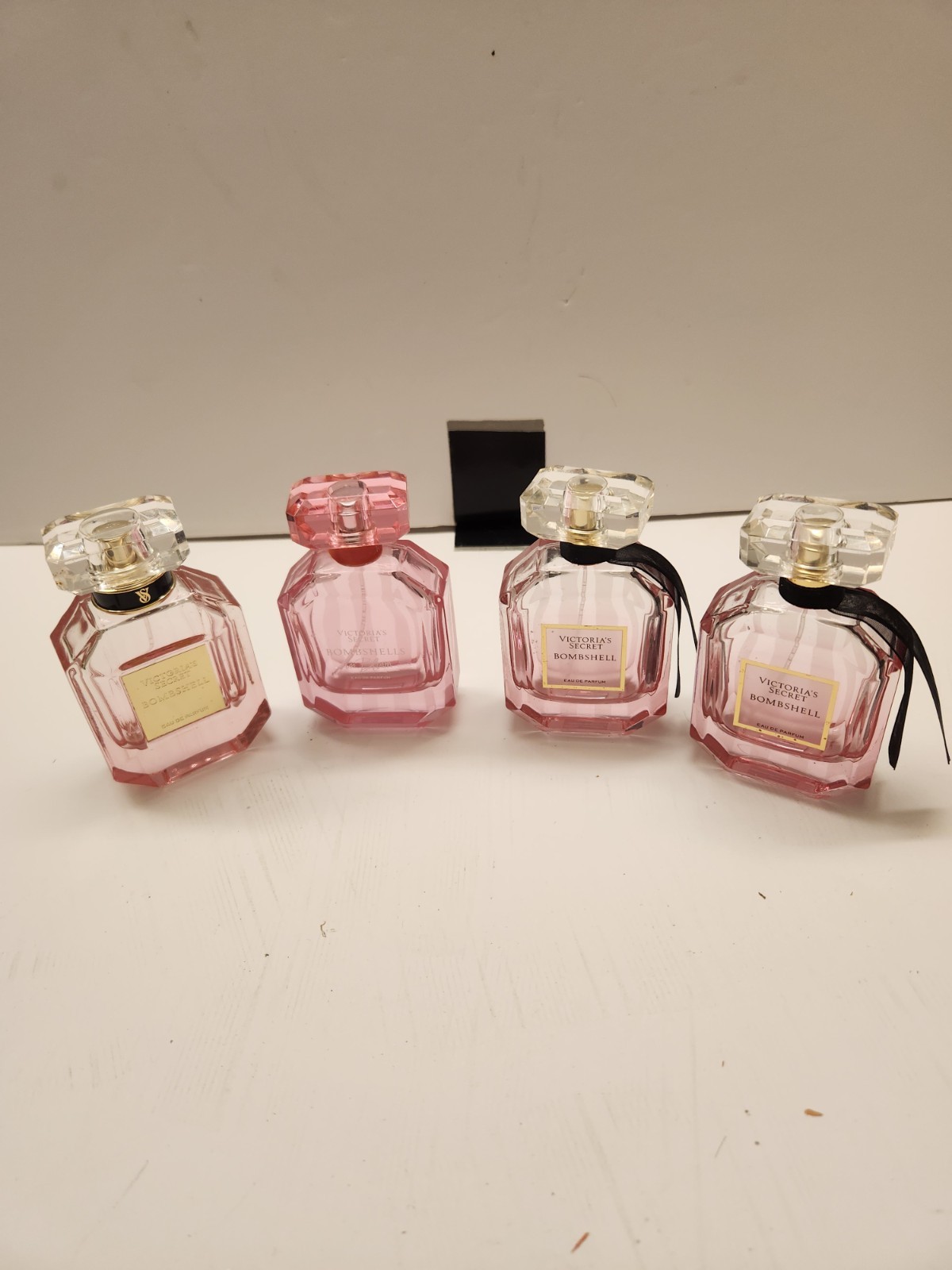 Four EMPTY Victoria\'s Secret Bombshell Perfume Bottles 1.7 Oz