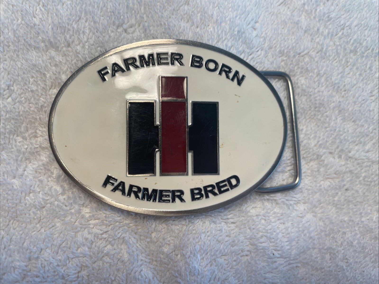 VTG NIP IH International Harvester Belt Buckle Enamel Finish Farmer Born Bred