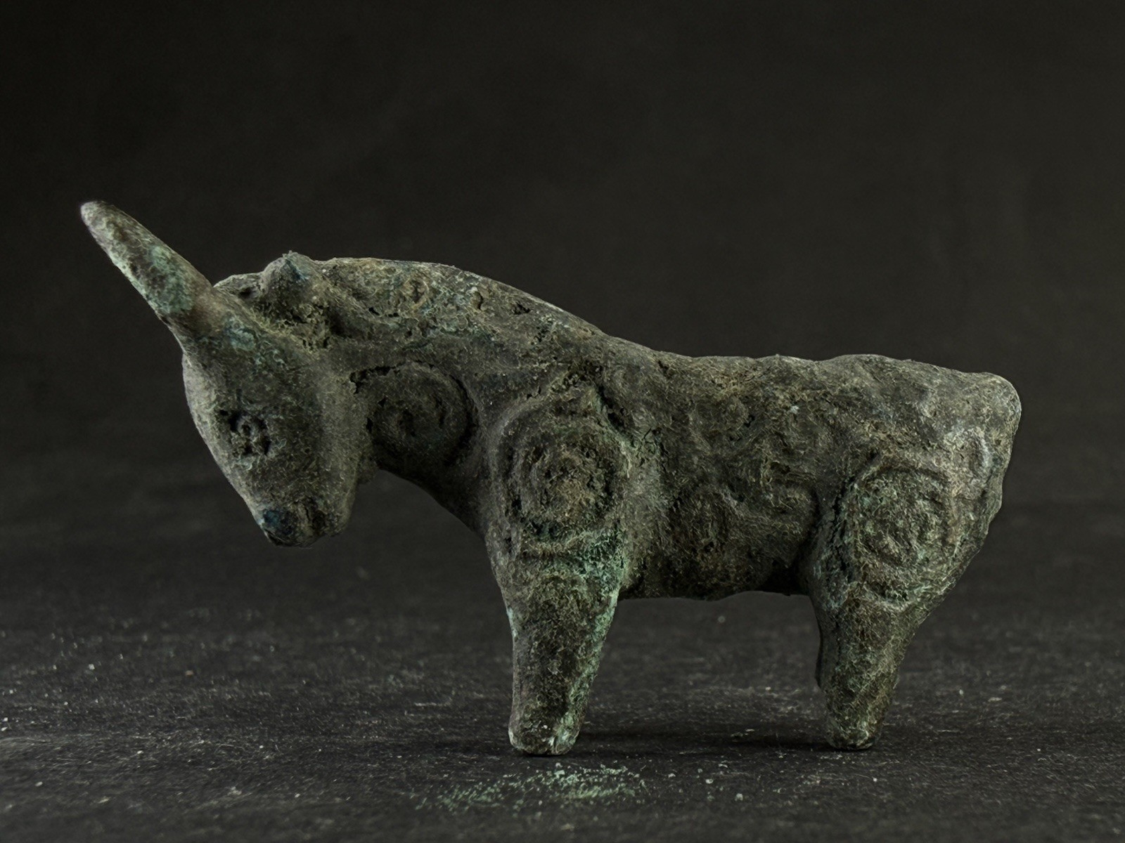 ANCIENT LUR1STAN BRONZE HIGHLY DECORATED BULL VOTIVE FIGURE - CIRCA 900-700 BC