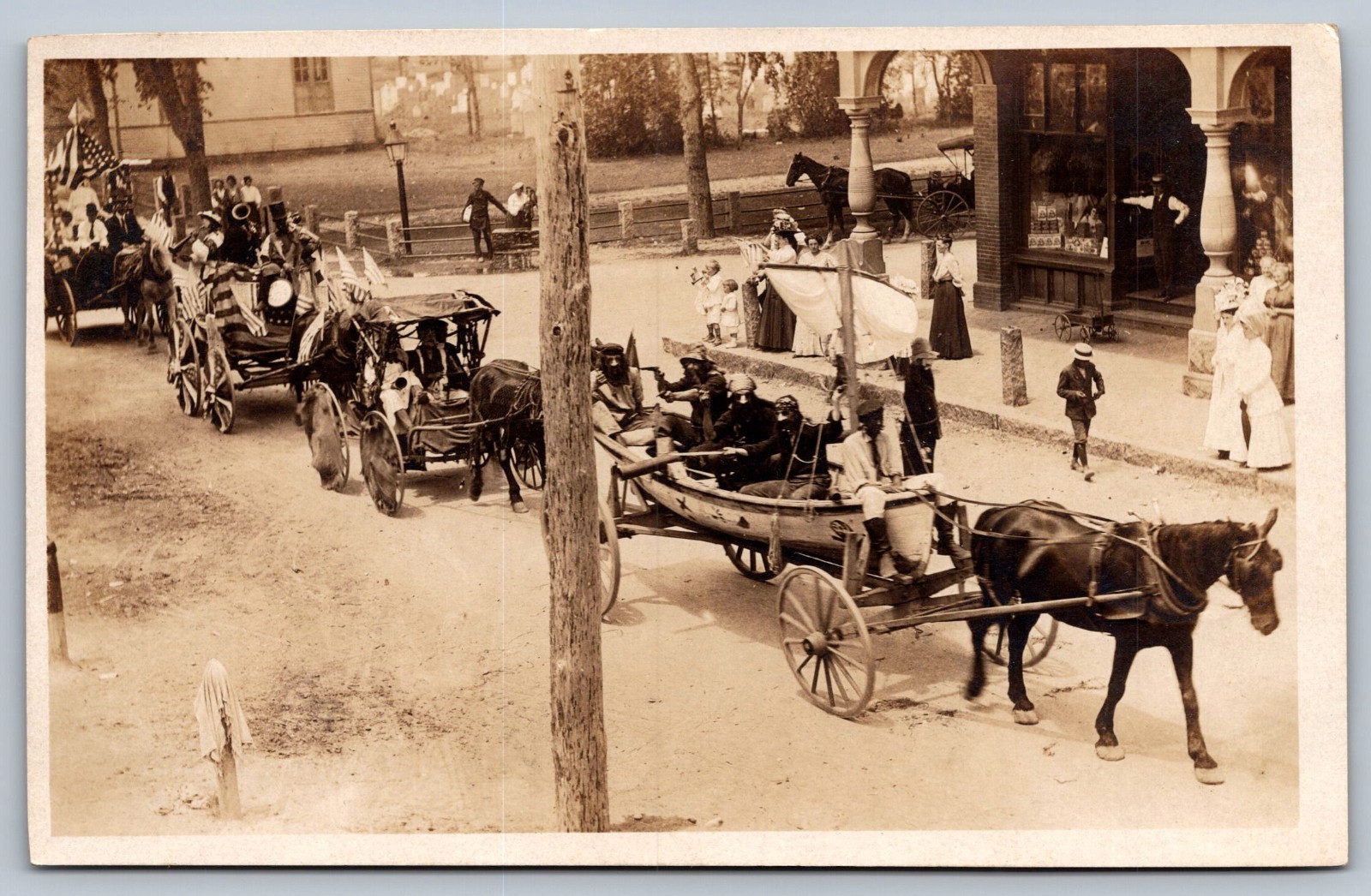 1908 RPPC JULY 4TH PARADE HARWICH MASSACHUSETTS CAPE COD LIFEBOAT W/PIRATES