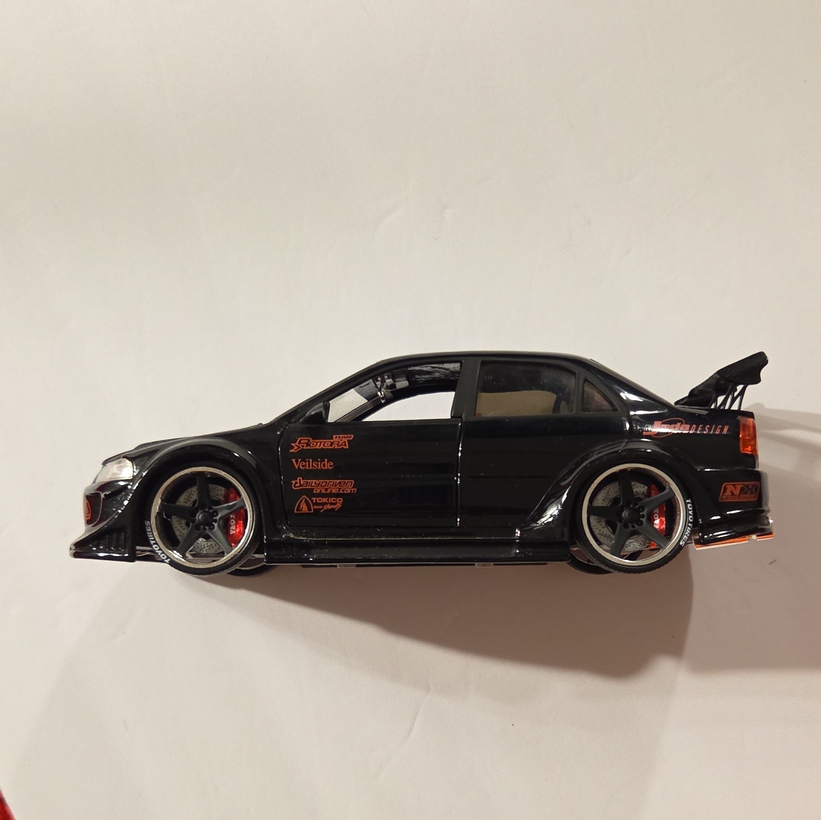 Jada Toys 1:24 Mitsubishi Import Racer Diecast Model Car Black Red Interior