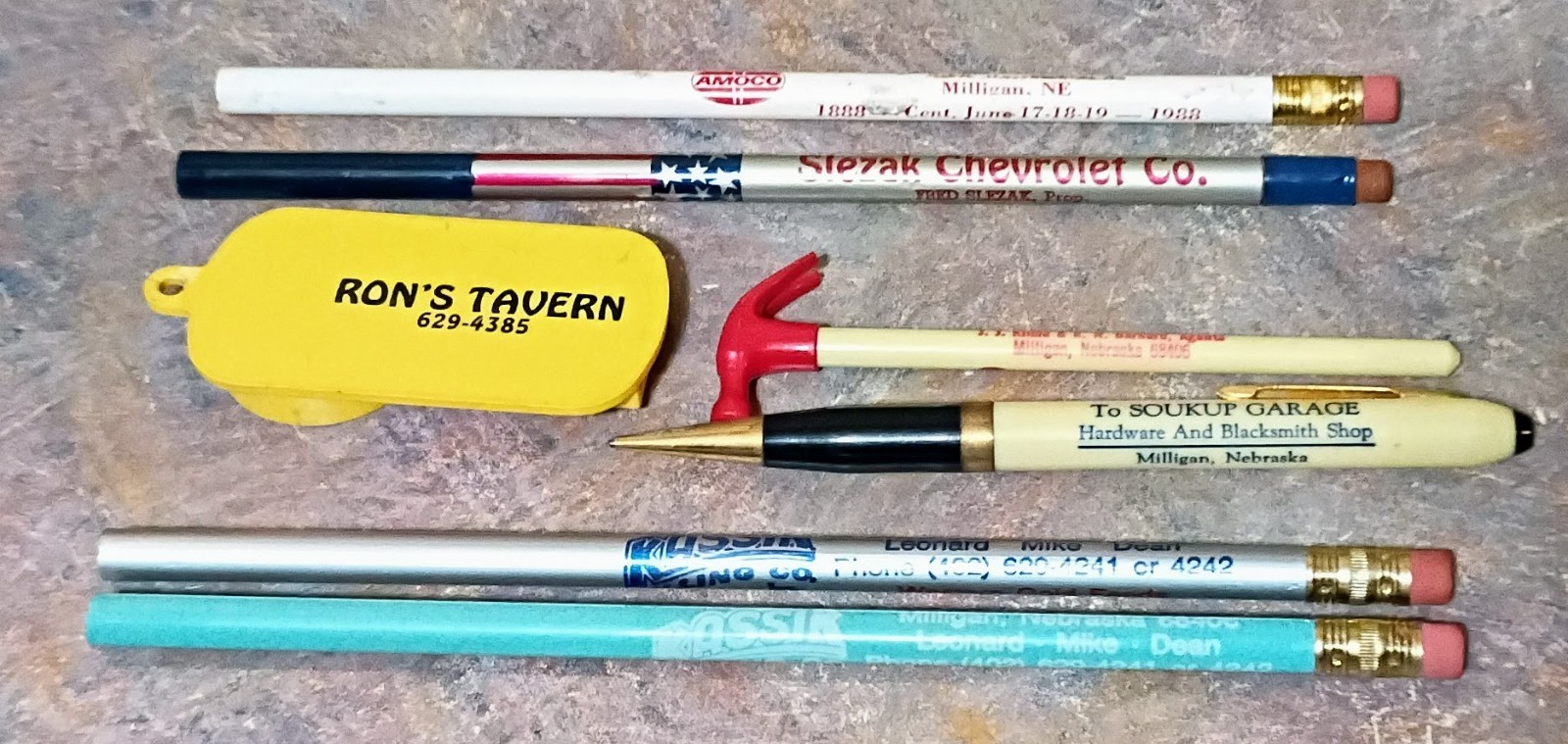 7 Vintage MILLIGAN NEBRASKA ADV. ITEMS...Pencils, Opener & MORE