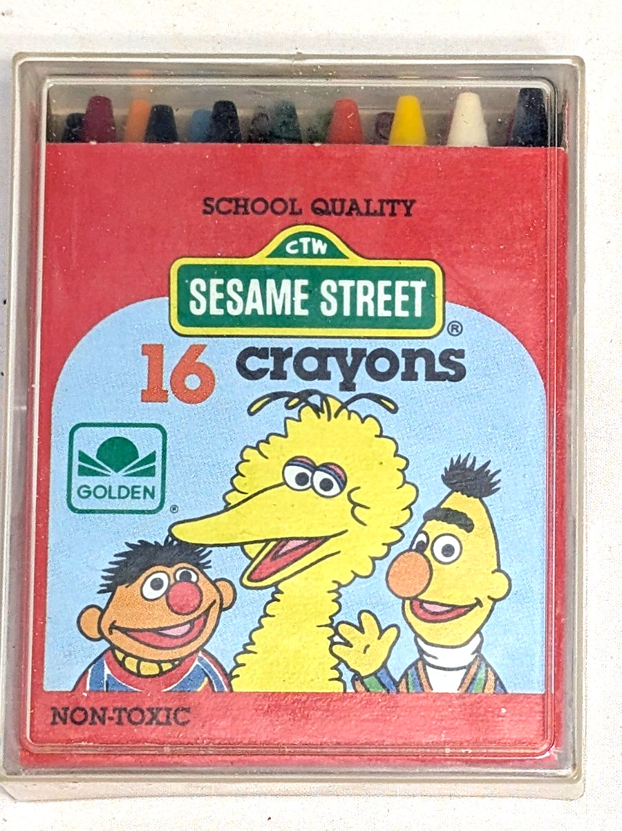 Vintage 1985 Sesame Street 16 Crayons unused in original box & Plastic box NOS