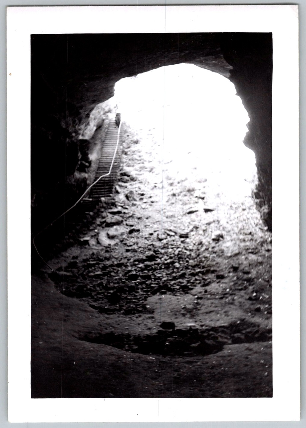 Vtg B&W Snapshot Interior View Of Large Cave With Wooden Stairs & Light 1950s