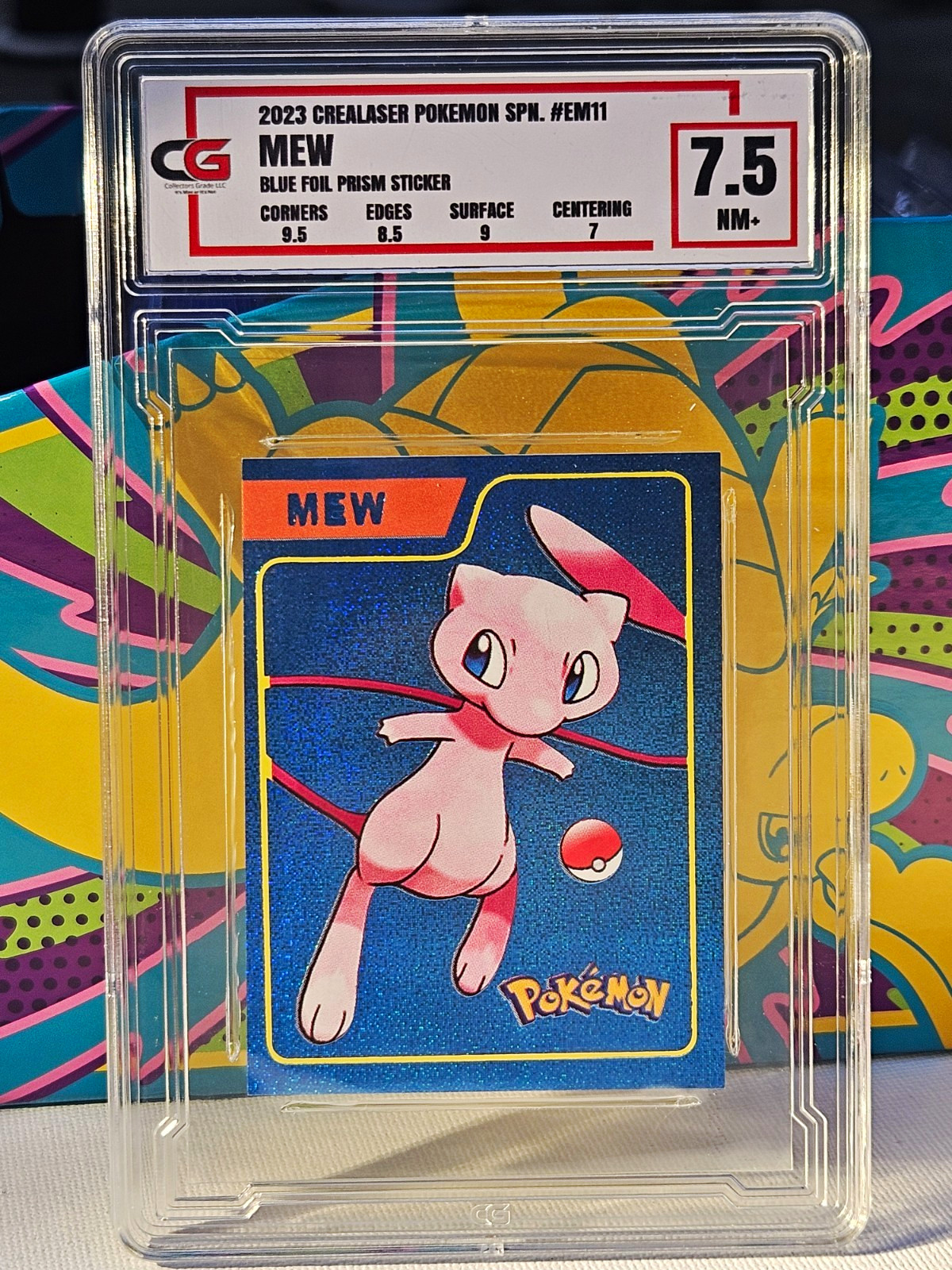 Crealaser Pokémon Mew #EM11 2023 SPN Blue Foil Prism Sticker CGC 7.5