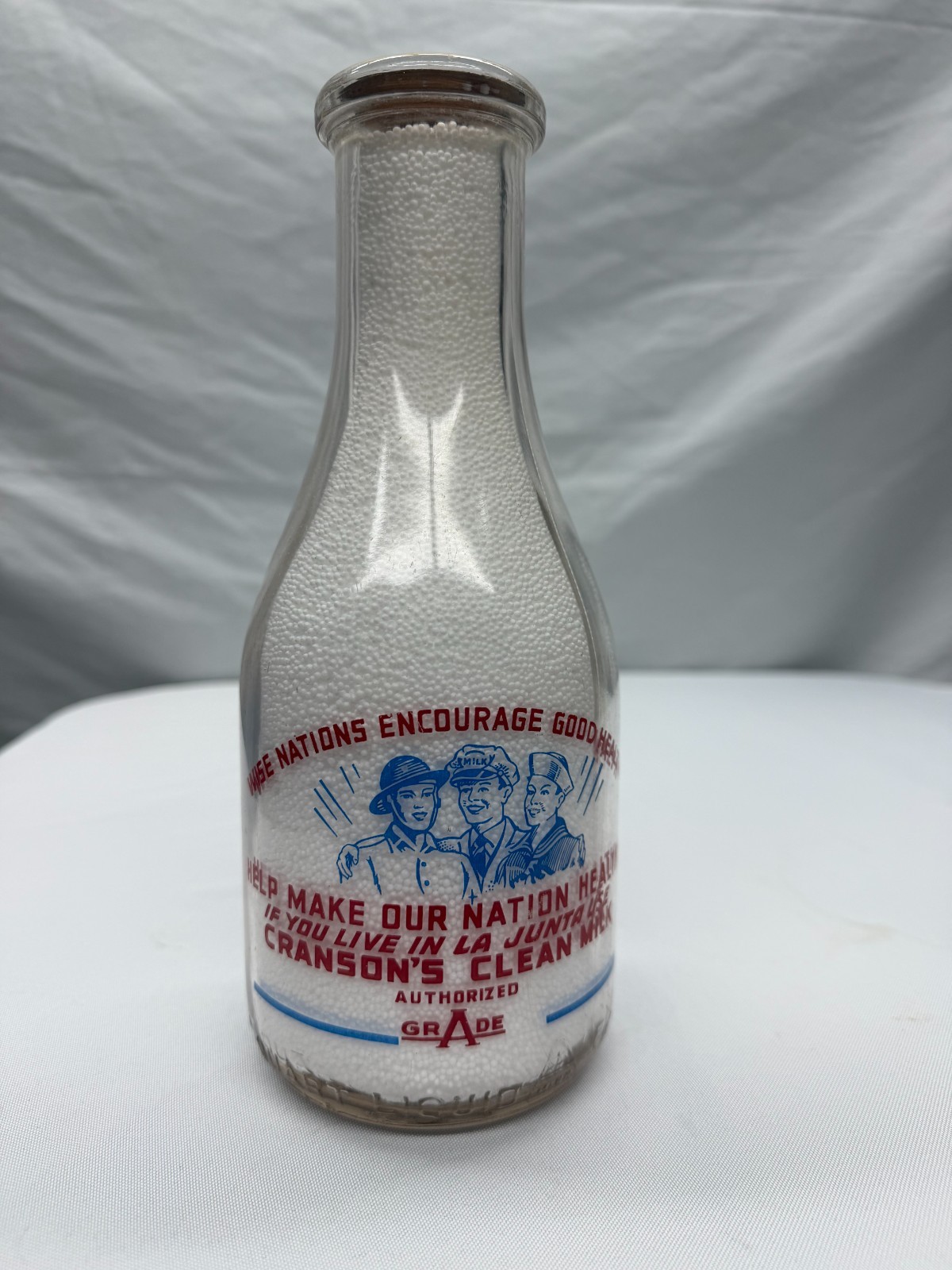 Antique Red & White Pyro War Slogan Milk Bottle - La Junta, Colorado
