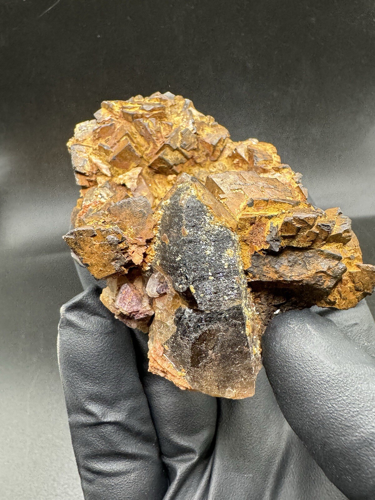 Lustrous rhombohedral siderite cluster with quartz and fluorite from Colorado