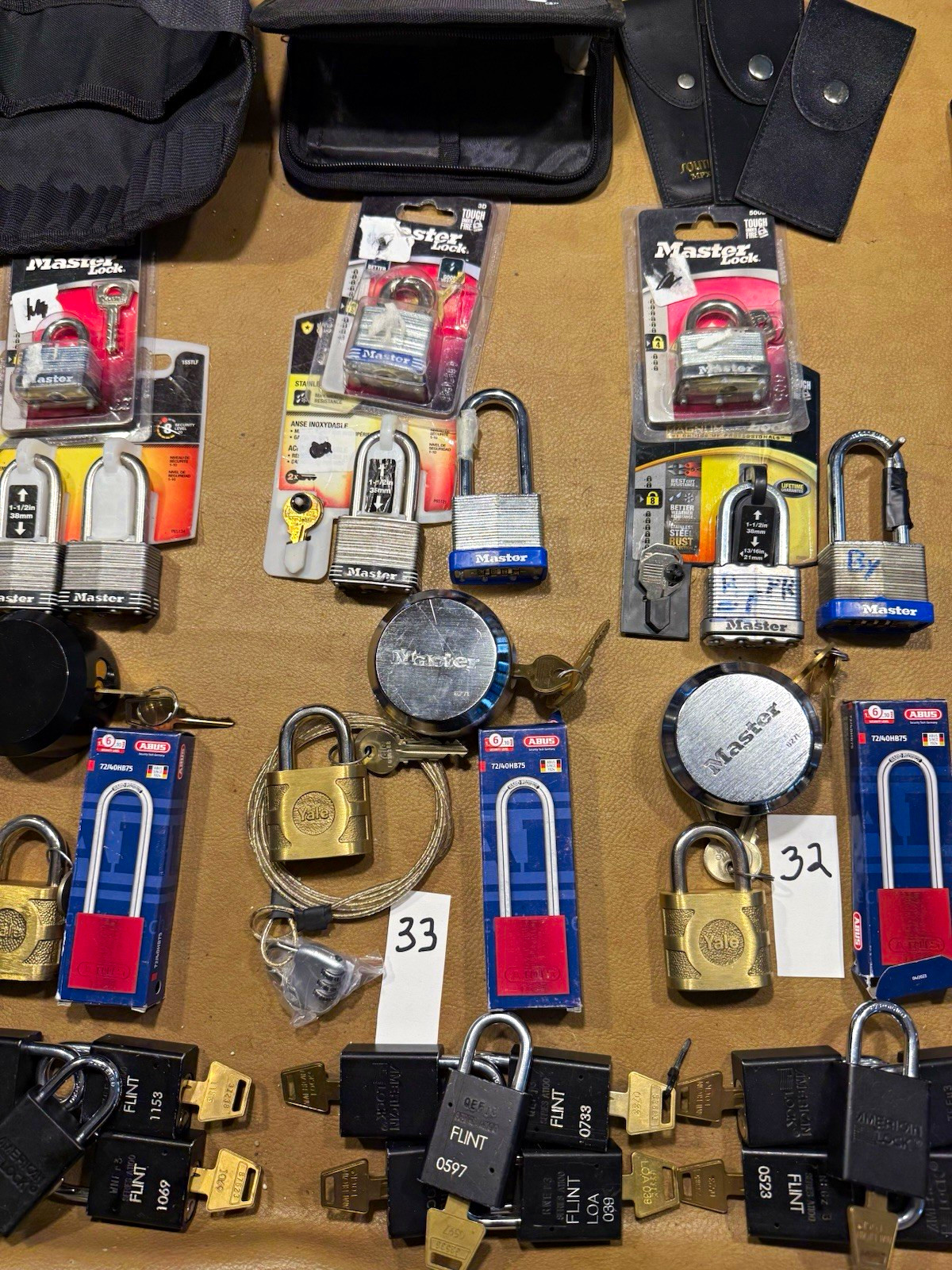FAJARDO LOCKS- LOT 33- LOT OF PADLOCKS, LOCKS AND A CASE (PLEASE)