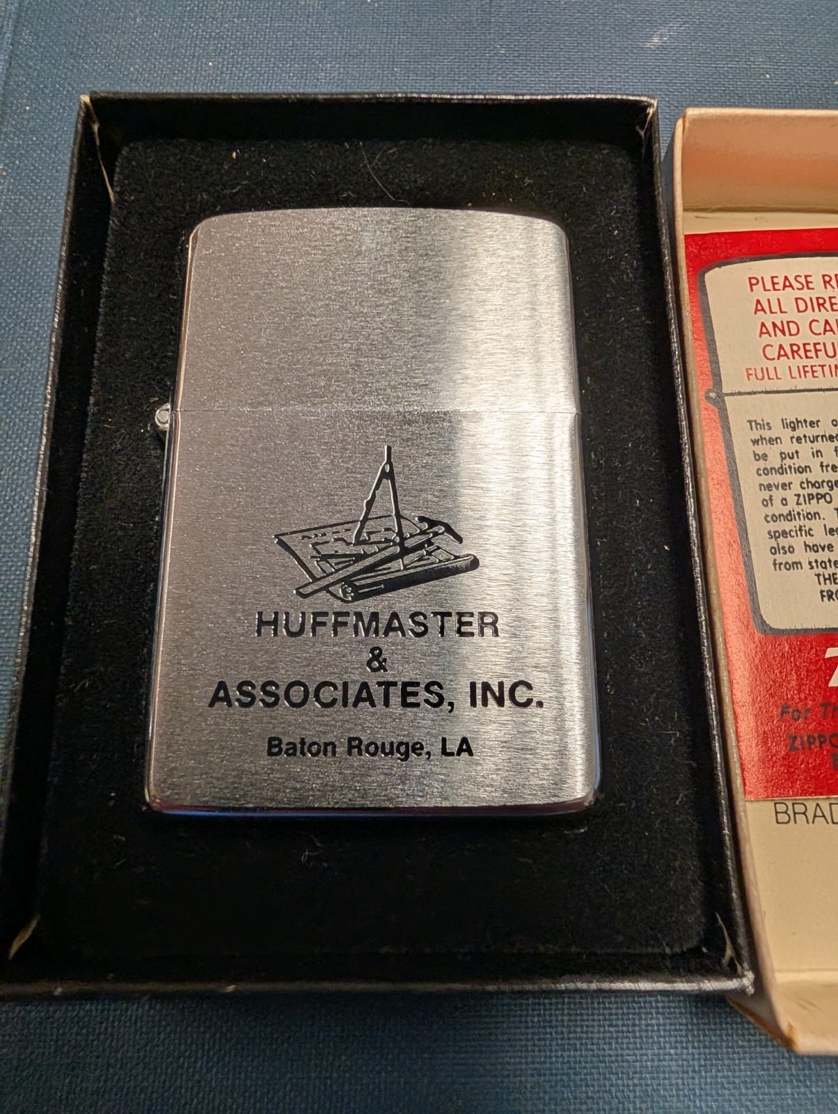 Vintage 1979 Zippo Lighter NOS NIB Unused Error Stamp Huffmaster Baton Rouge LA