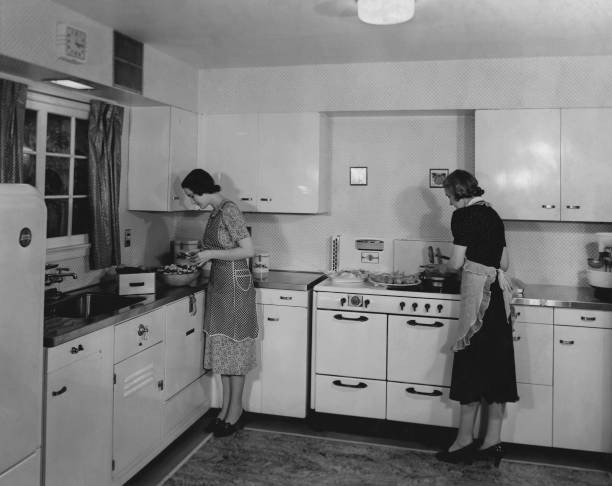 Two women making dinner in the 1940's Historic Old Photo