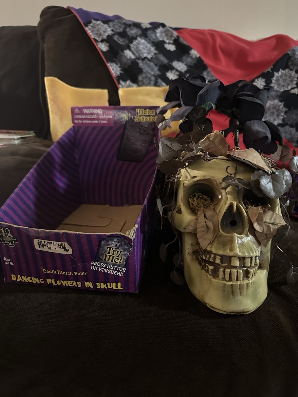 Gemmy  Halloween  Light-up & Musical Skull Dancing Black Roses,  Skull Works