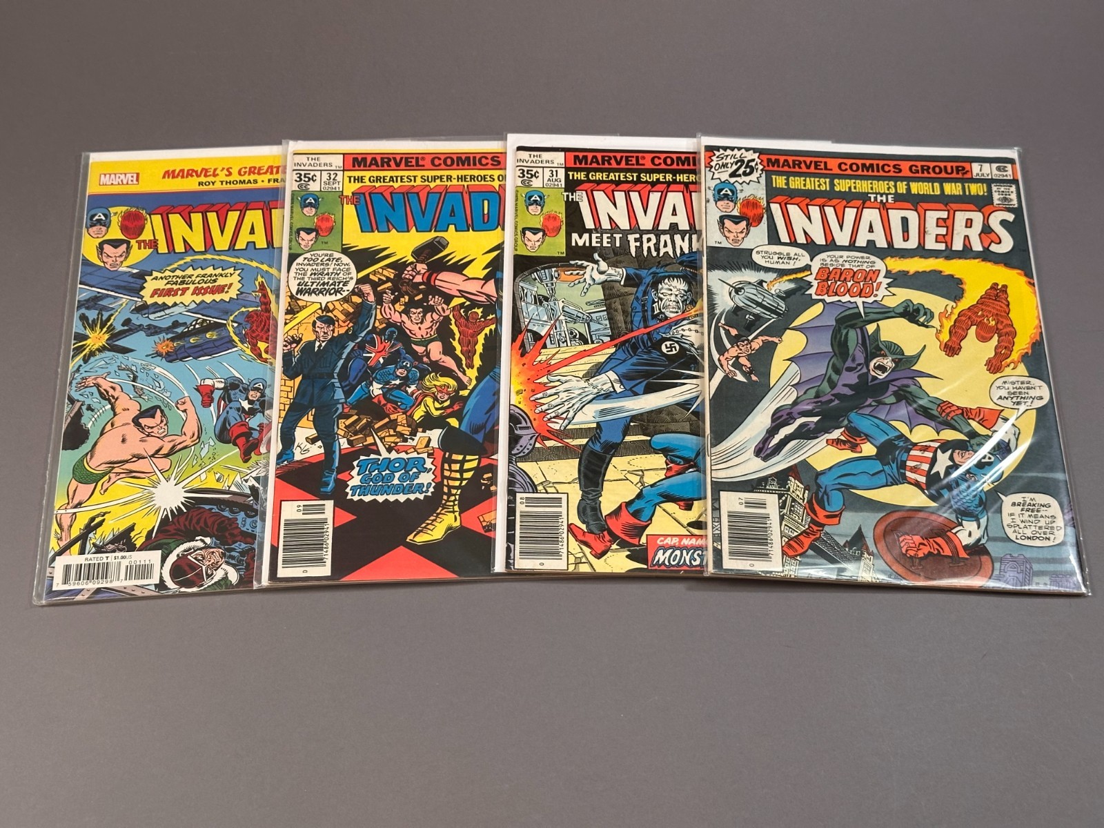 4 Marvel comics... The Invaders # 1 reprint, 7, 31, 32,  all high grade