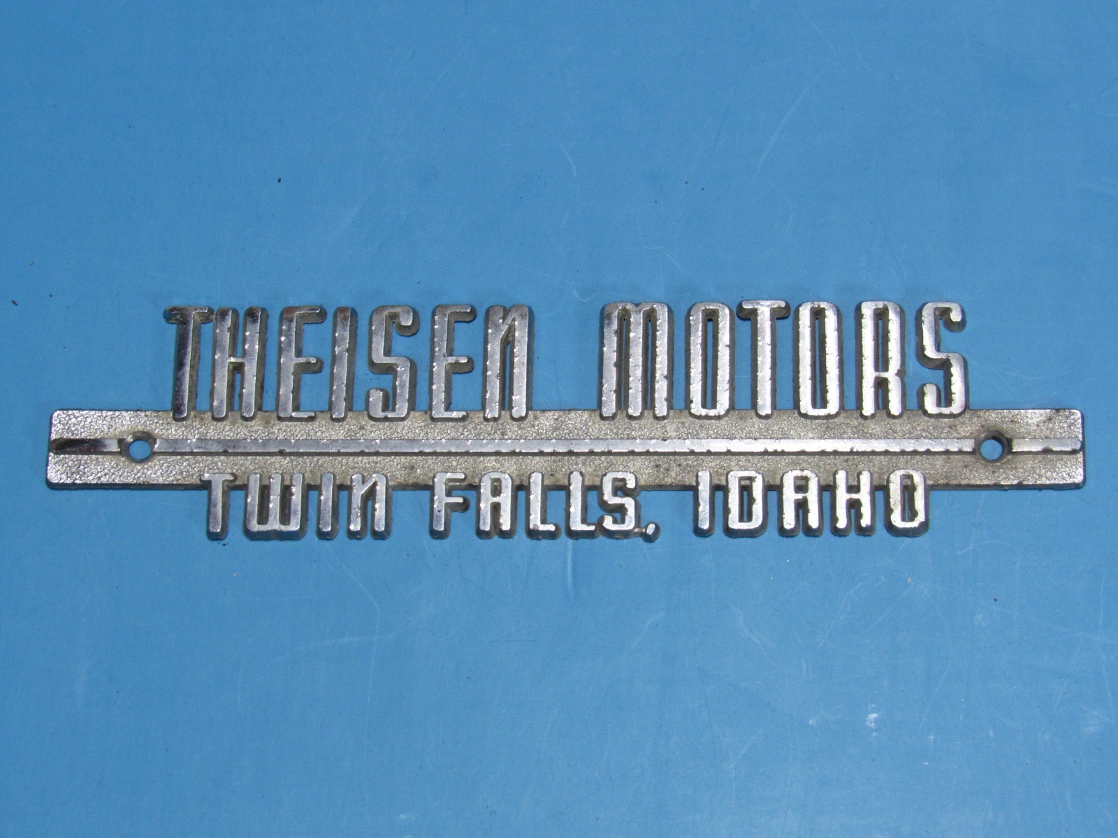 VTG Theisen Lincoln-Mercury Twin Falls Idaho Metal Dealership Badge Emblem Tag