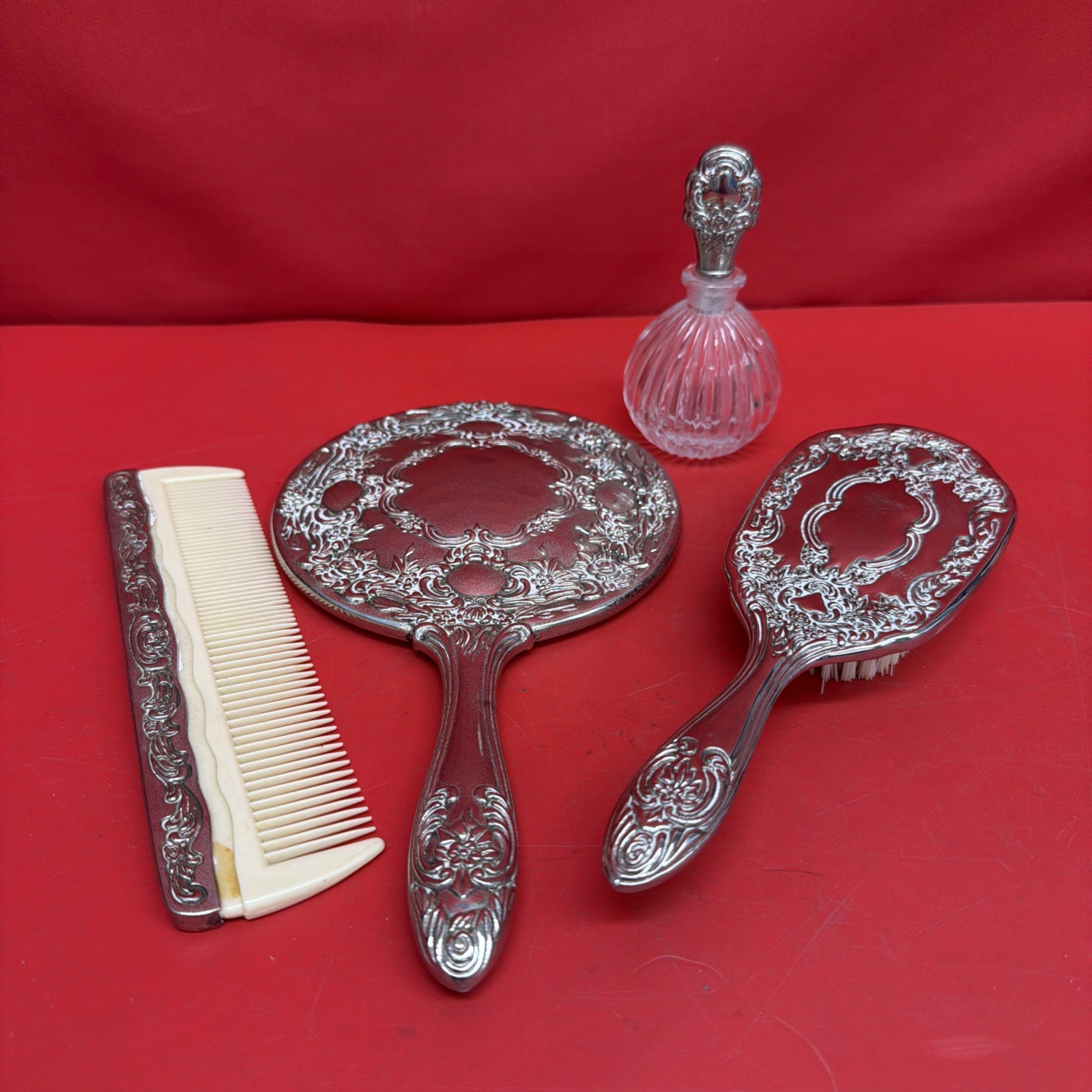 Vintage 4 Pc Ornate Silver Tone Vanity Set Mirror Brush Comb Perfume Bottle