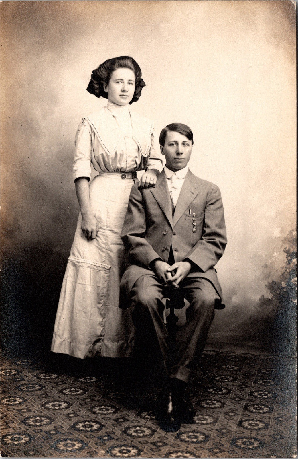 Postcard Real Photo RPPC Young Man in Suit & Woman with Bow in Hair