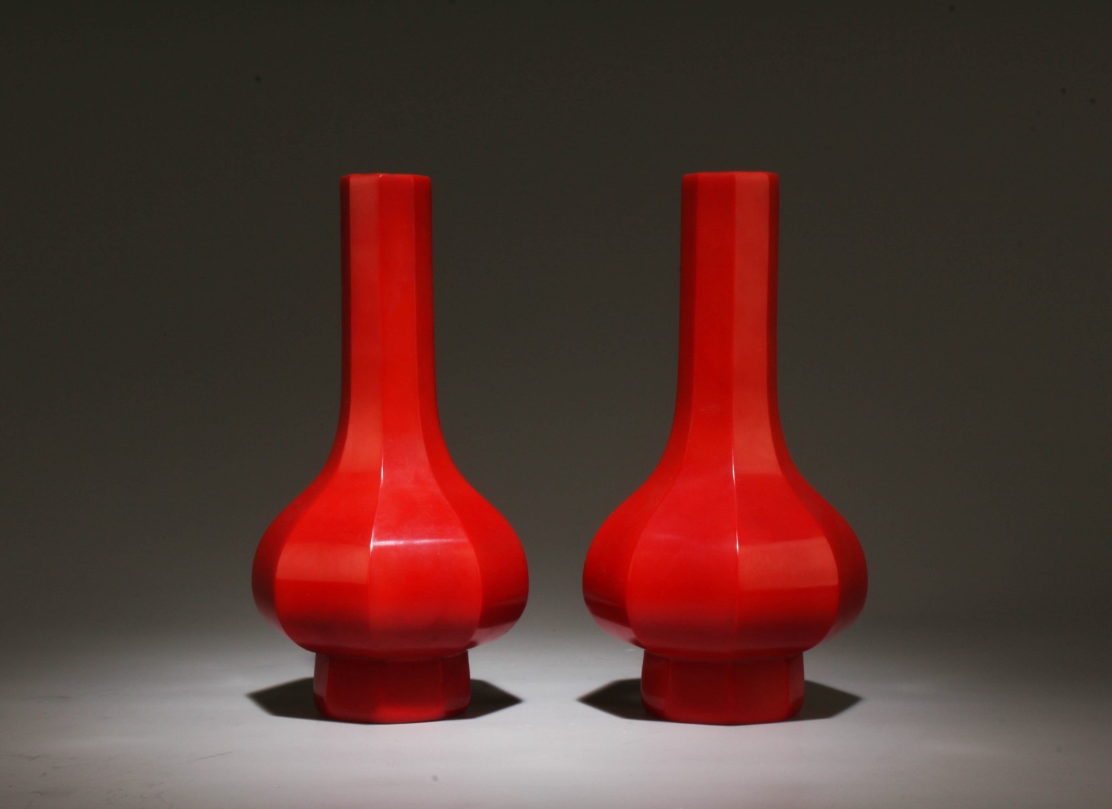 A Pair of Red Peking Glass Vases