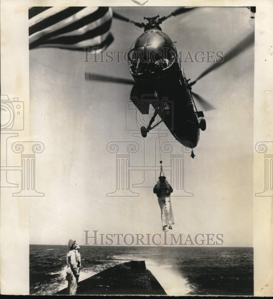 1955 Press Photo US Ambassador to Spain John Davis Lodge hoisted by Helicopter