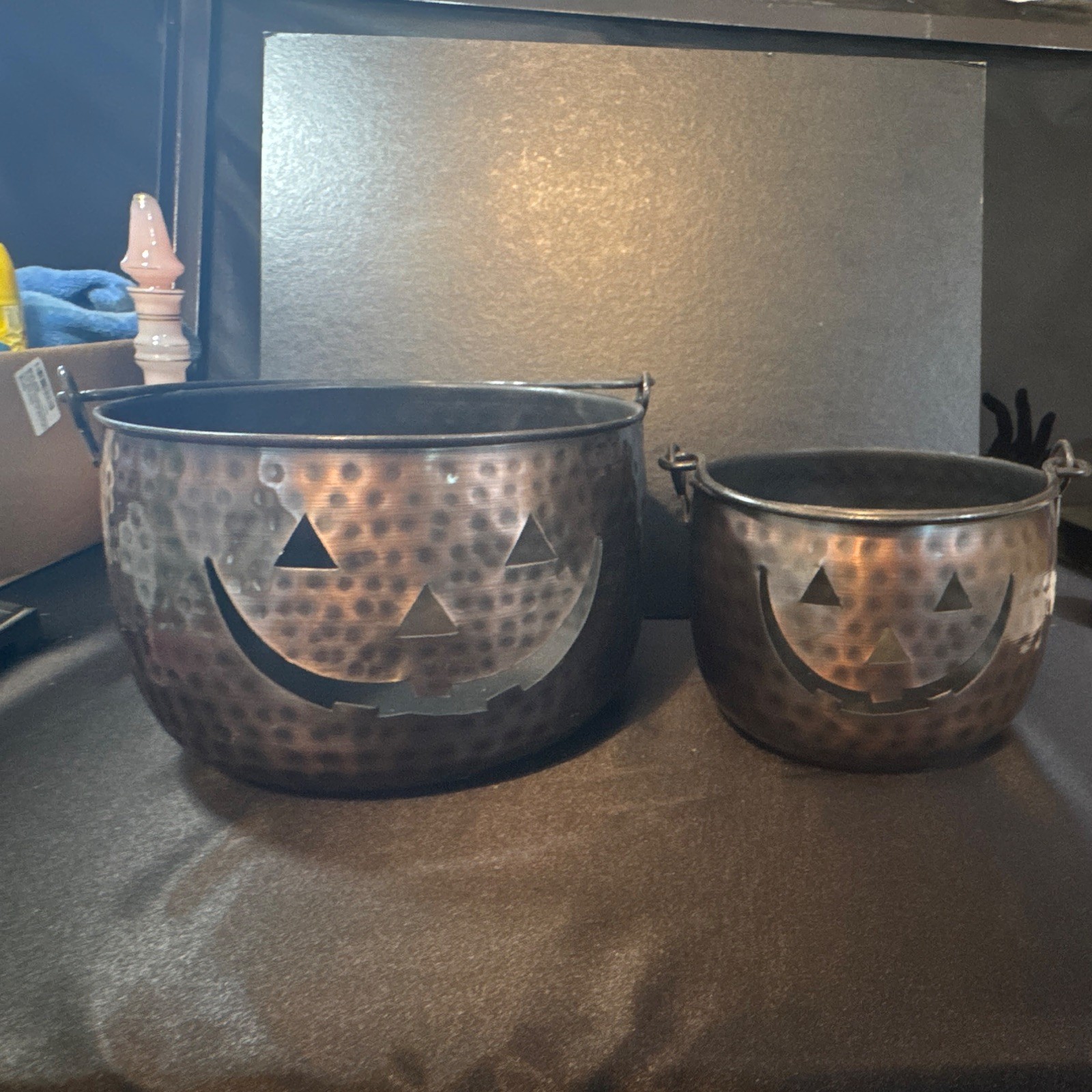 A Pair Of Metal Jack-O’-Lanterns