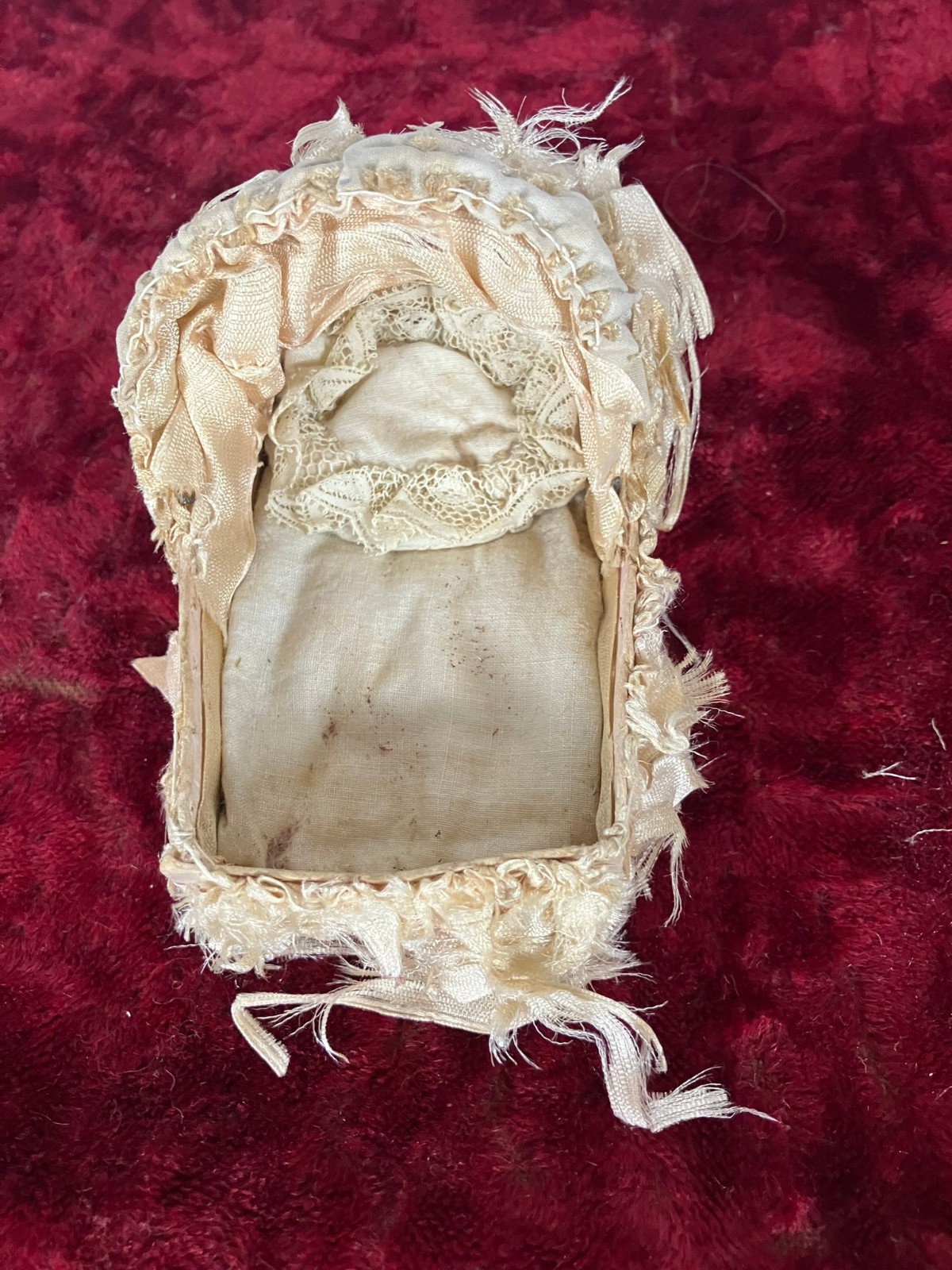 Vintage French Miniature silk-covered doll cradle on cardboard