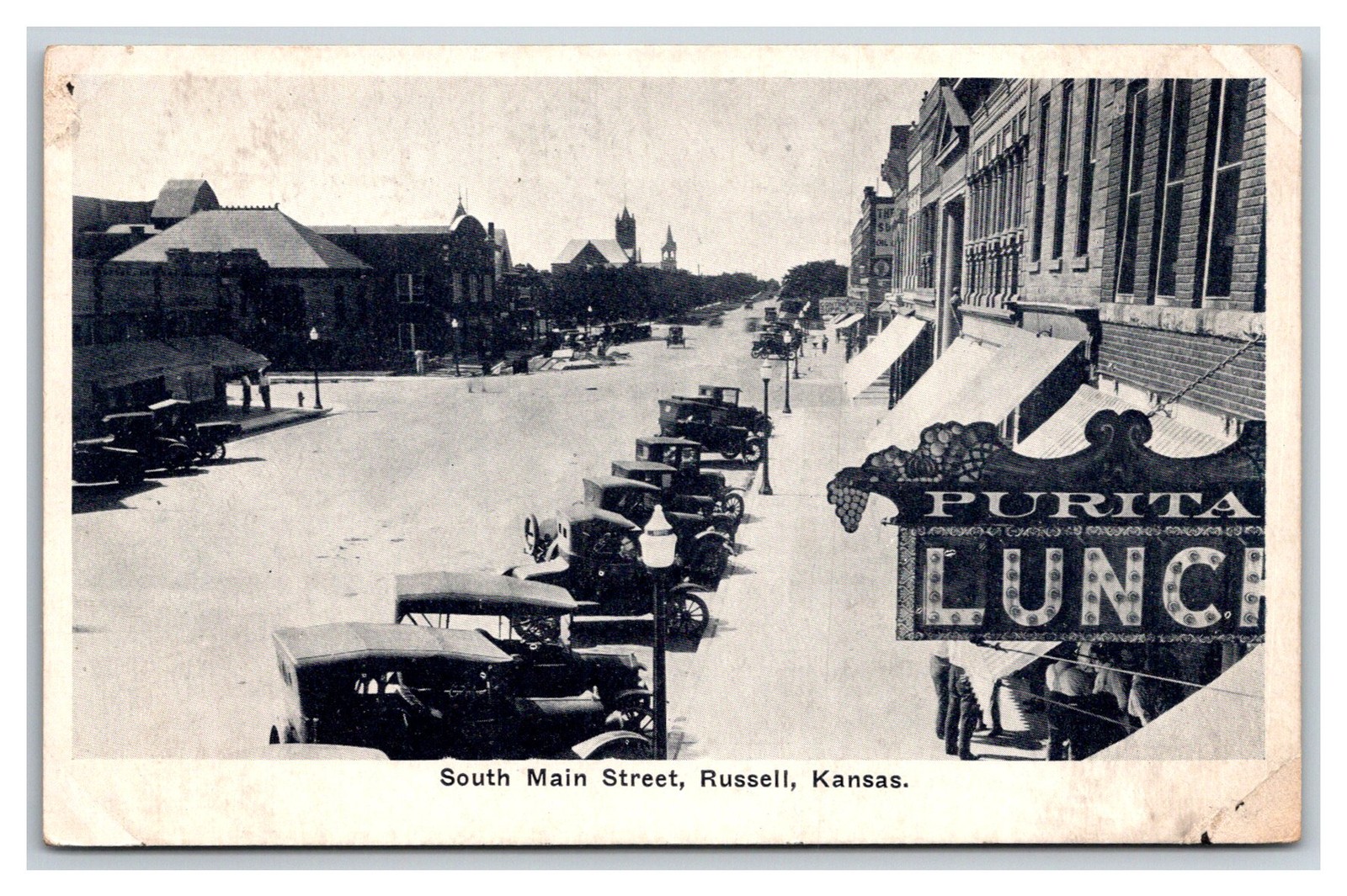 RUSSELL KS ~ Early Main street view ~ Kansas