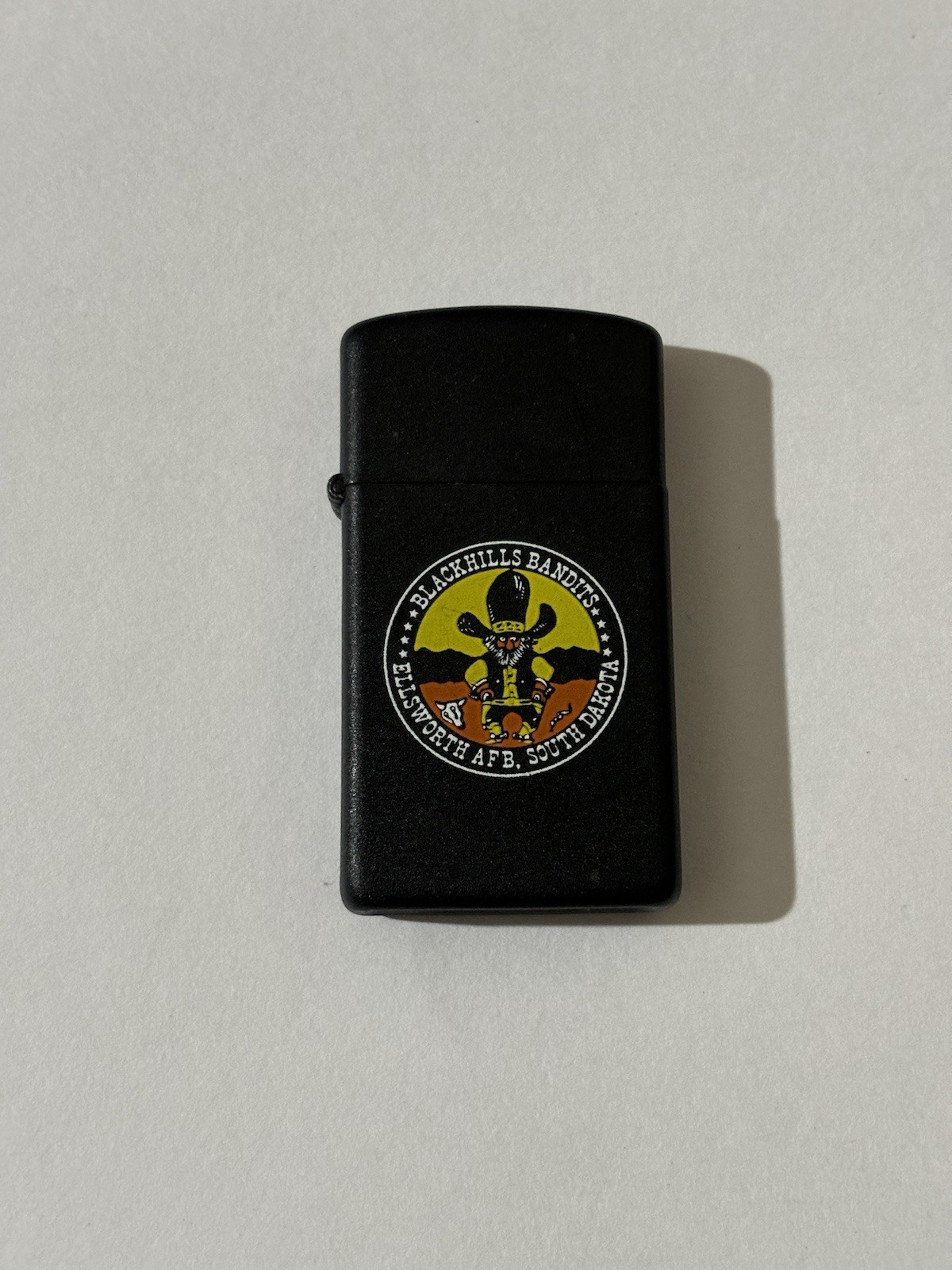Vtg 1986 Black Hills Bandits Zippo Lighter Slim Ellsworth AFB South Dakota