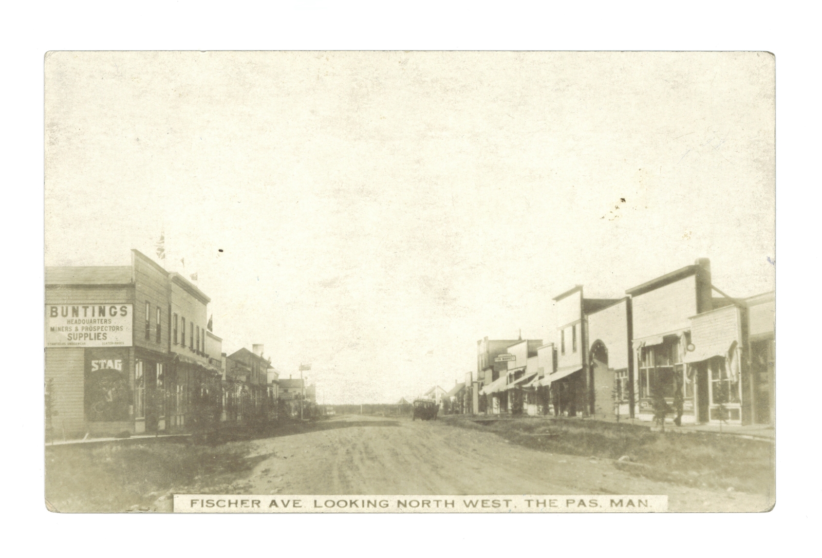 Fischer Ave looking north west The Pas Man - Street with store fro- Old Photo