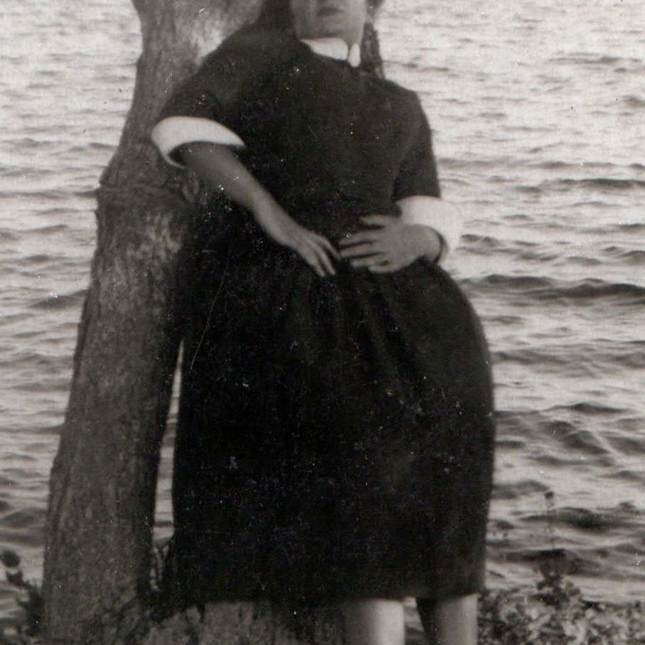 c1920s Lakeside Tree Leaning Woman Snapshot Photo Barefoot Dark Dress Shore Vtg