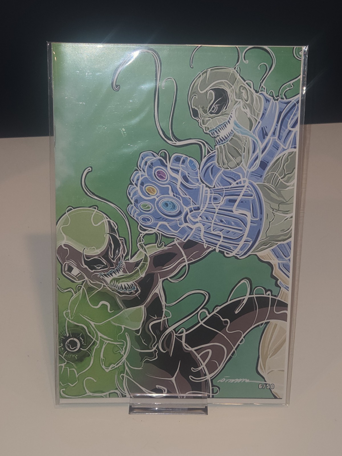 Fractured Realms: Venomized Frieza vs Thanos Artbook MegaCon 2026 NM 06/50 Demir