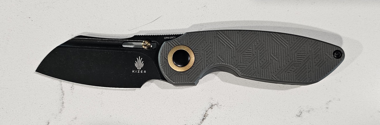 Kizer October Milled Titanium Handle 20CV Steel Blade Thumb Stud Mod
