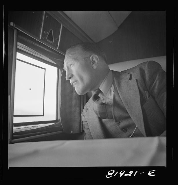 Photo:Man in Train or Carriage 1930s Peering Out Window White Shirt Suit