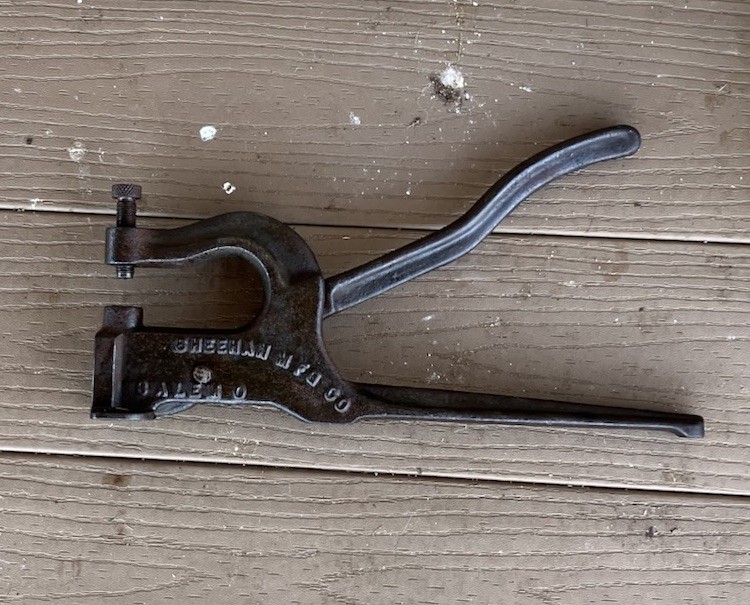Vintage Sheehan MFG cast iron rivet leather punch