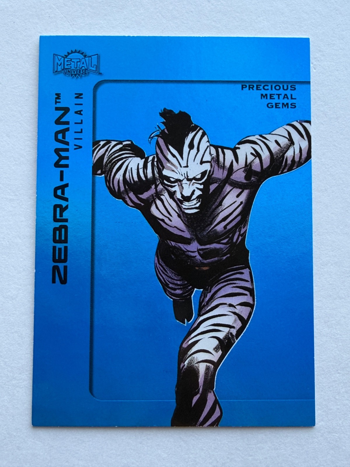 Zebra-Man 2025 Skybox Metal Universe Batman Blue Precious Metal Gems PMG # 29/50